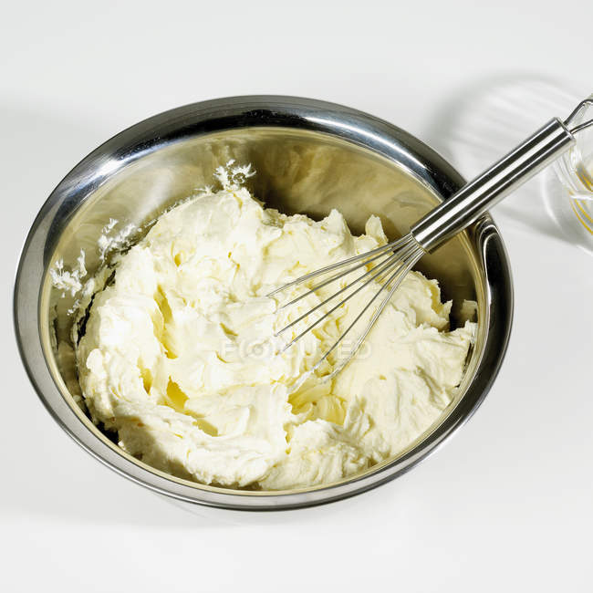 Cheesecake mixture with whisk — Stock Photo