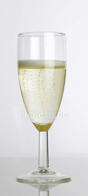 Glass of cold champagne — Stock Photo