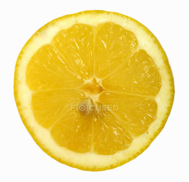 Rebanada de limón fresco - foto de stock