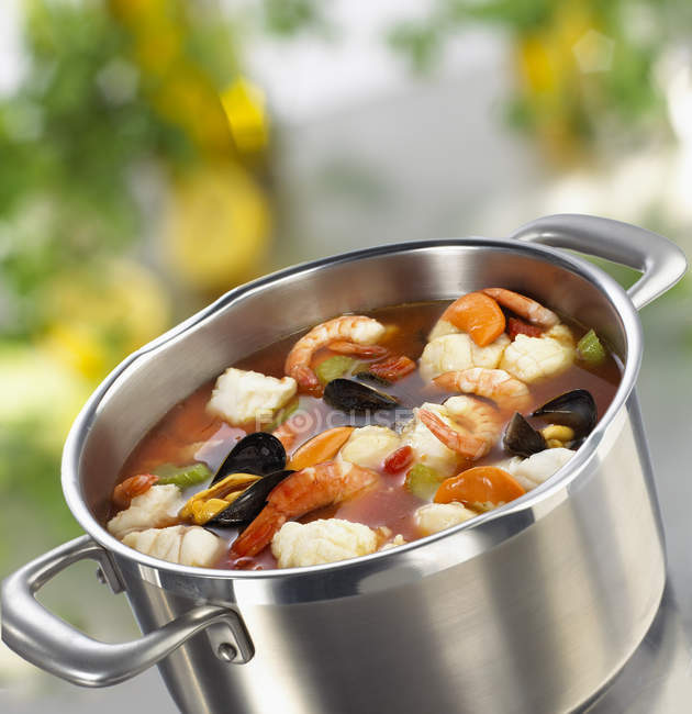 Closeup view of Bouillabaisse fish soup in pot — Stock Photo