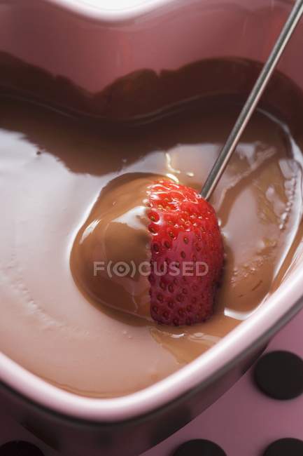 Chocolate fondue with strawberry — Stock Photo