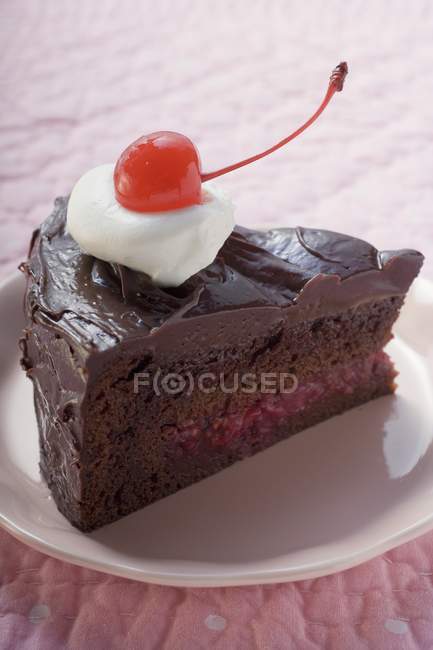 Chocolate cake with cherry — Stock Photo