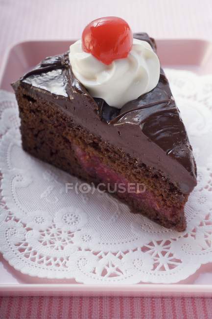 Chocolate cake with cherry — Stock Photo