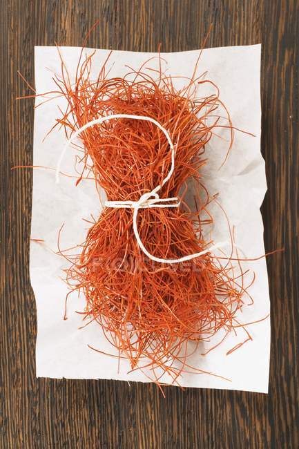 Saffron threads tied in bunch — Stock Photo