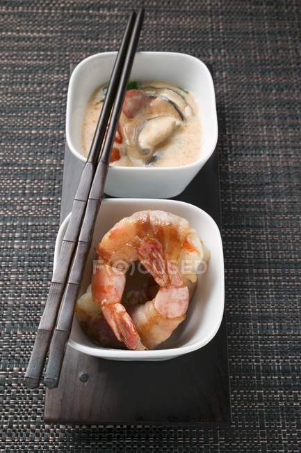 Bacon-wrapped king prawn — Stock Photo