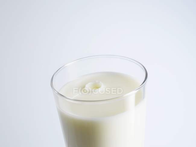 Glass of tasty milk — Stock Photo