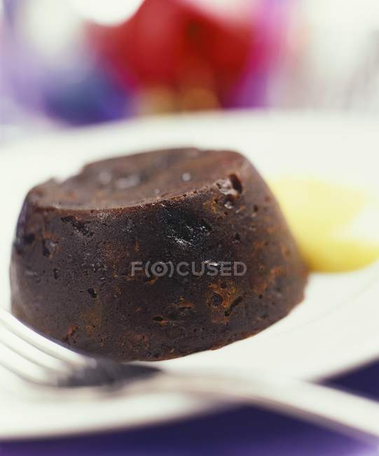 Christmas pudding on plate — Stock Photo