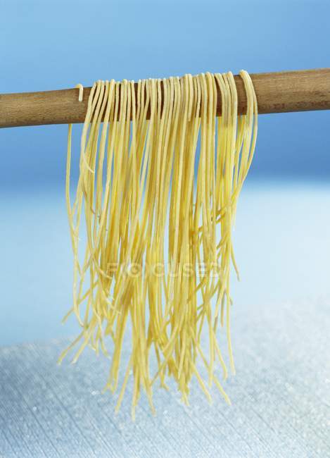 Homemade pasta hanging — Stock Photo