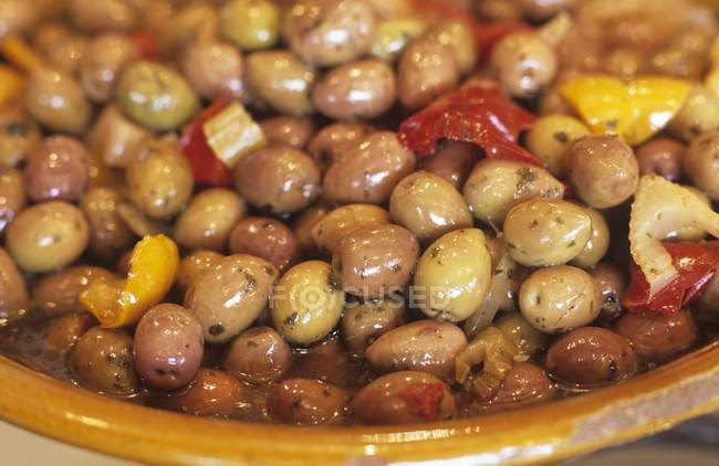 Pickled olives in bowl — Stock Photo