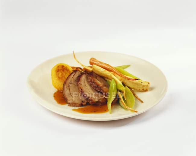 Lamb with vegetables on plate — Stock Photo
