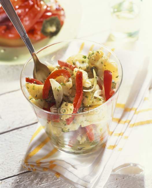 Potato salad with peppers and herb dressing — Stock Photo