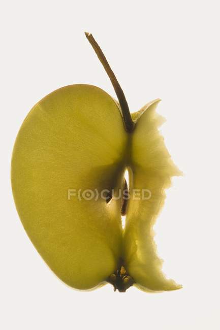 Slice of fresh apple with stalk — Stock Photo