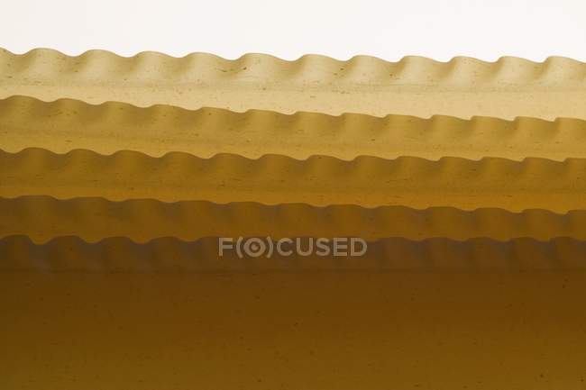 Dry lasagne sheets — Stock Photo