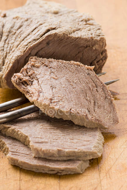 Boiled beef, partly sliced — Stock Photo