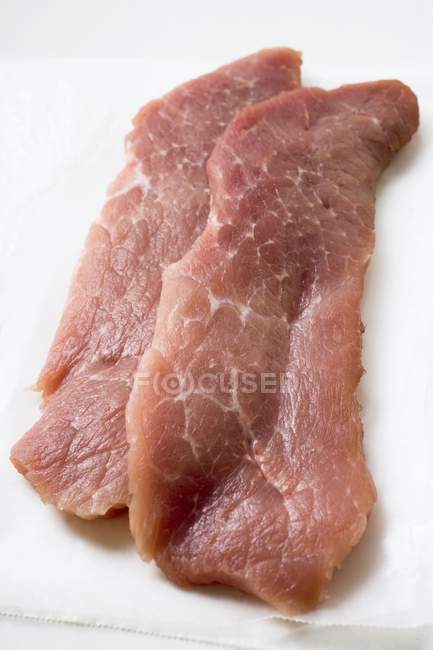 Raw pork escalopes — Stock Photo
