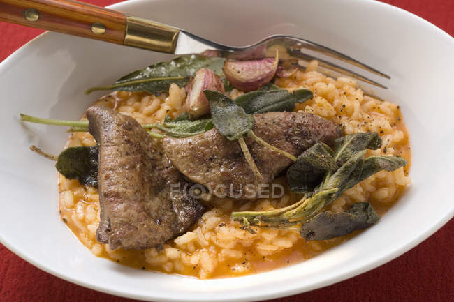 Risotto with fried calf liver — Stock Photo