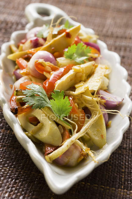 Bamboo shoots with peppers — Stock Photo