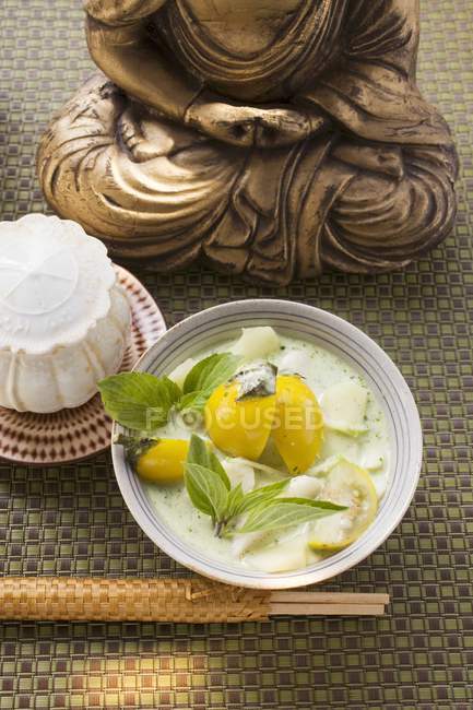 Coconut soup with potatoes — Stock Photo
