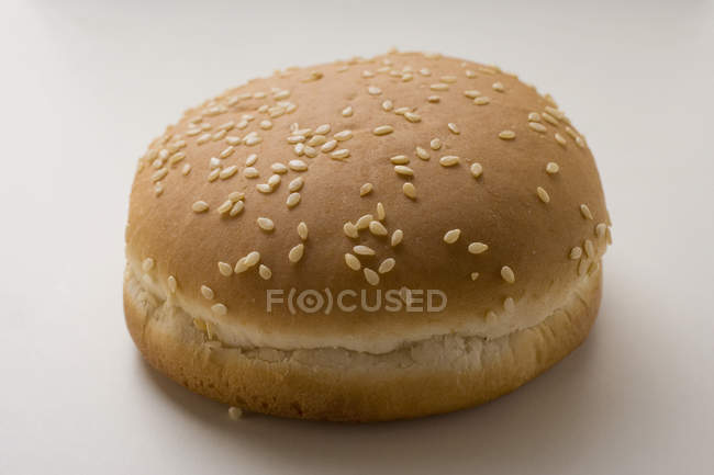 Hamburger bun with sesame seeds — Stock Photo