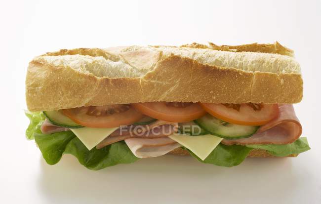 Baguette with ham and cheese — Stock Photo