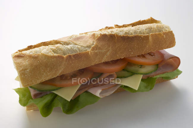 Baguette with ham and cheese — Stock Photo