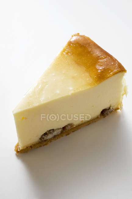 Un pedazo de pastel de queso - foto de stock