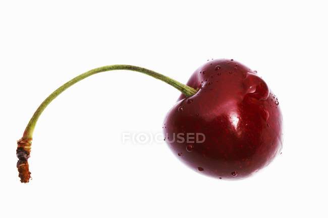 Cherry with drops of water — Stock Photo