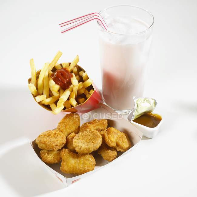 Chicken nuggets and milkshake — Stock Photo