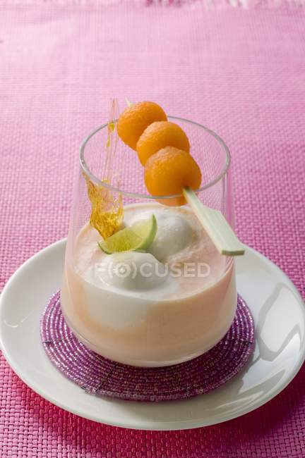 Coconut soup with galia melon — Stock Photo