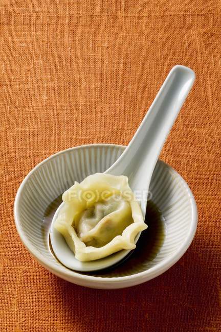 Pasta parcel on spoon — Stock Photo
