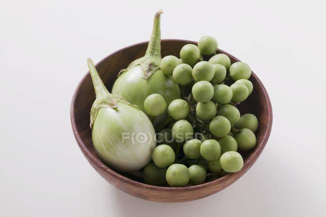 Green baby aubergines — Stock Photo