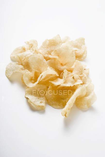 Plusieurs chips de pommes de terre frites — Photo de stock