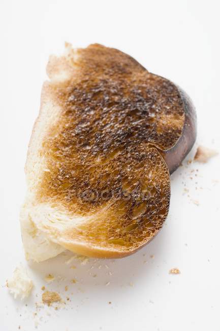 Кусочек сожжённого тоста — стоковое фото