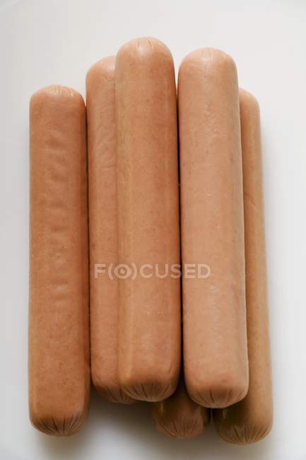 Montón de Frankfurters crudos - foto de stock