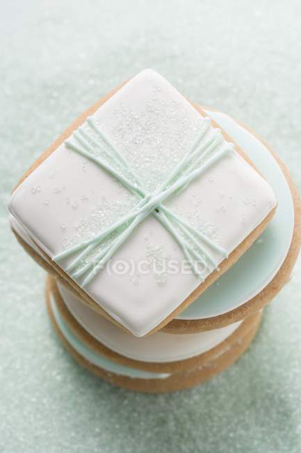 Biscuits and pastel-colored sugar — Stock Photo