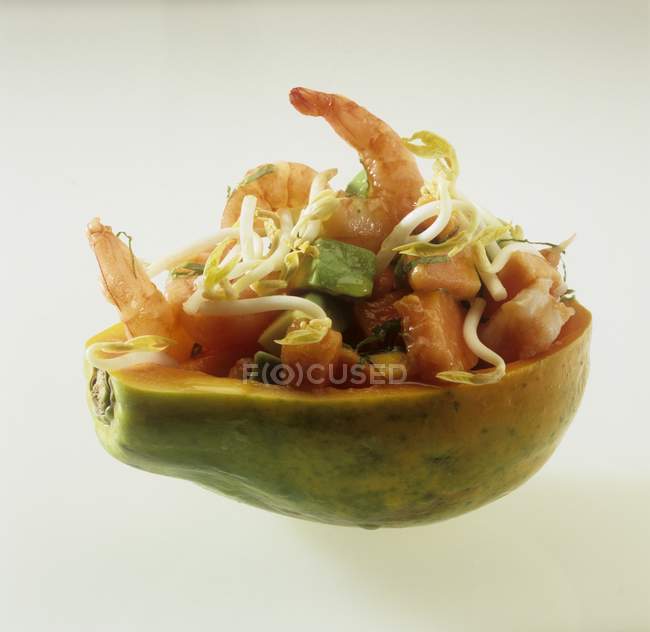 Closeup view of stuffed papaya with sprouts and shrimps — Stock Photo