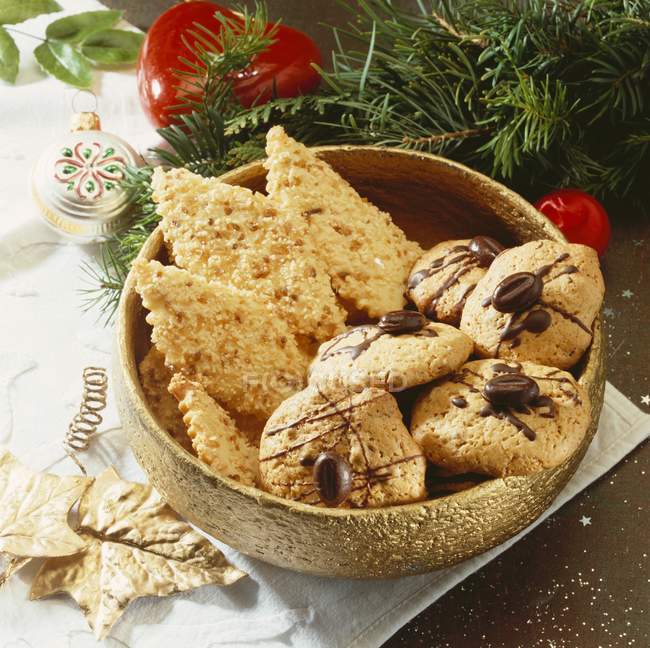Chocolate cookies and sweet pastry diamonds — Stock Photo