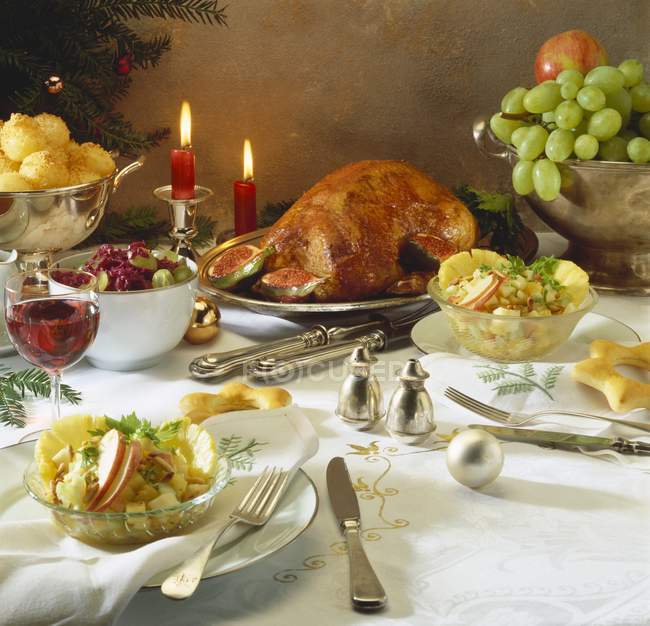 Christmas meal with roast goose — Stock Photo