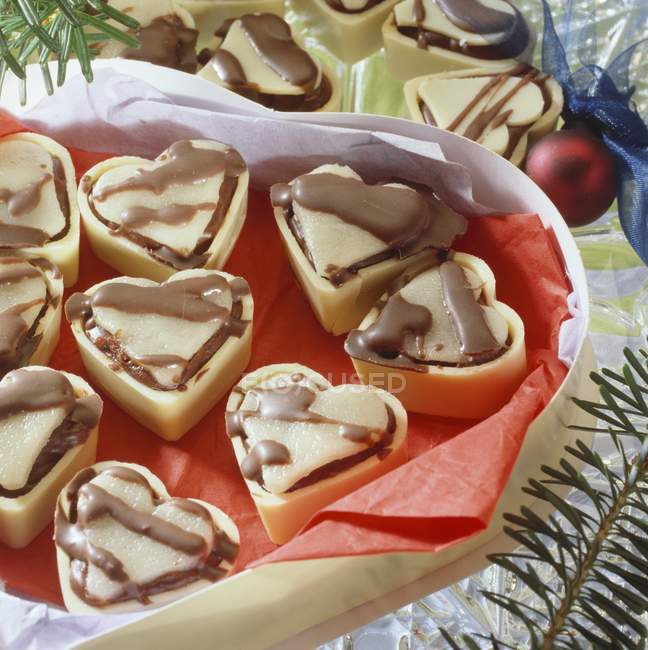 Closeup view of cherry truffle hearts in  gift box — Stock Photo