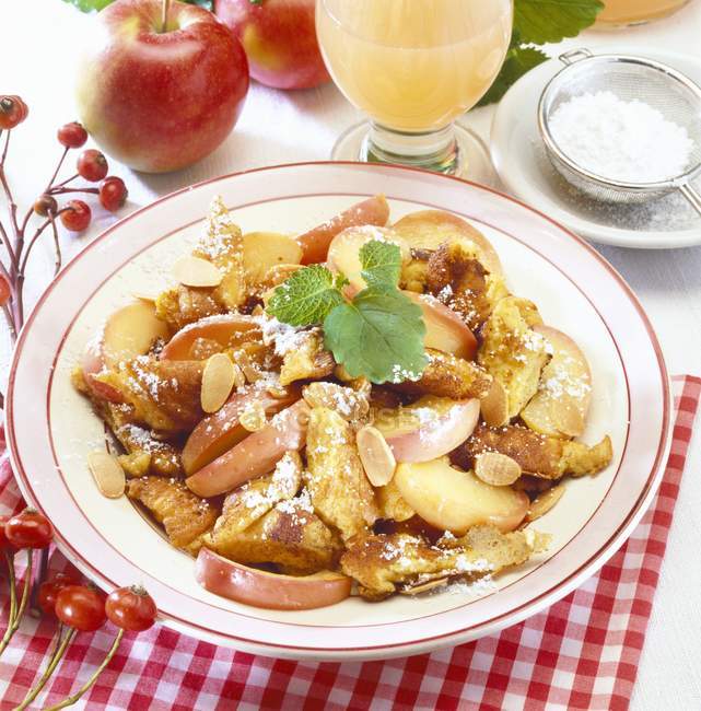 Closeup view of Kaiserschmarrn with stewed apple — Stock Photo