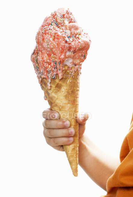 Hand holding cone — Stock Photo
