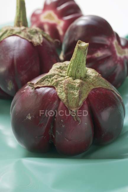 Few baby aubergines — Stock Photo