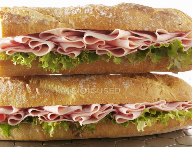 Ham baguettes with lettuce — Stock Photo