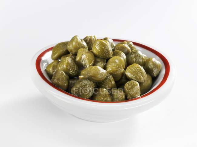 Pickled Capers in small bowl — Stock Photo