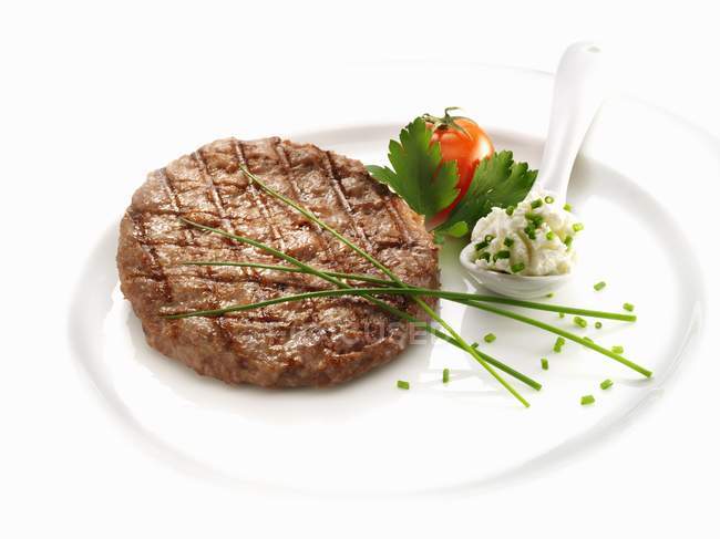 Hamburger steak with thick cream — Stock Photo