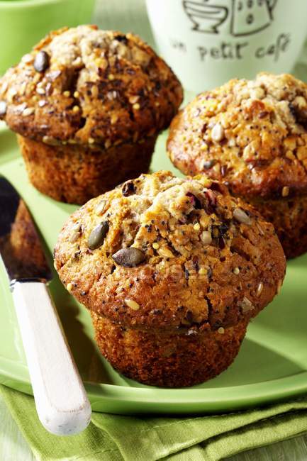 Muffins with fruit and seeds — Stock Photo