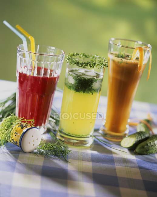 Glasses of juice on table — Stock Photo