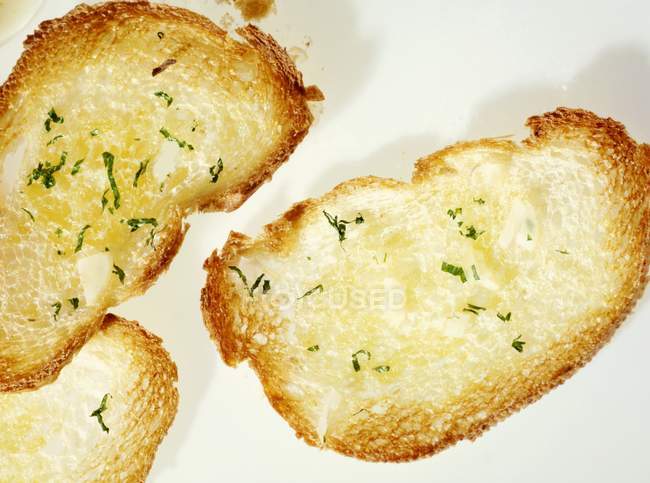 Garlic baguette slices — Stock Photo