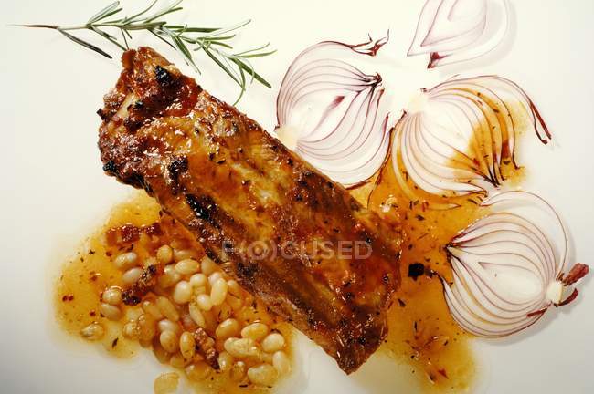 Costelas de porco em molho de churrasco — Fotografia de Stock