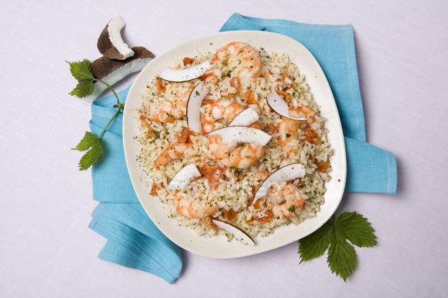 Risotto with prawns and coconut — Stock Photo
